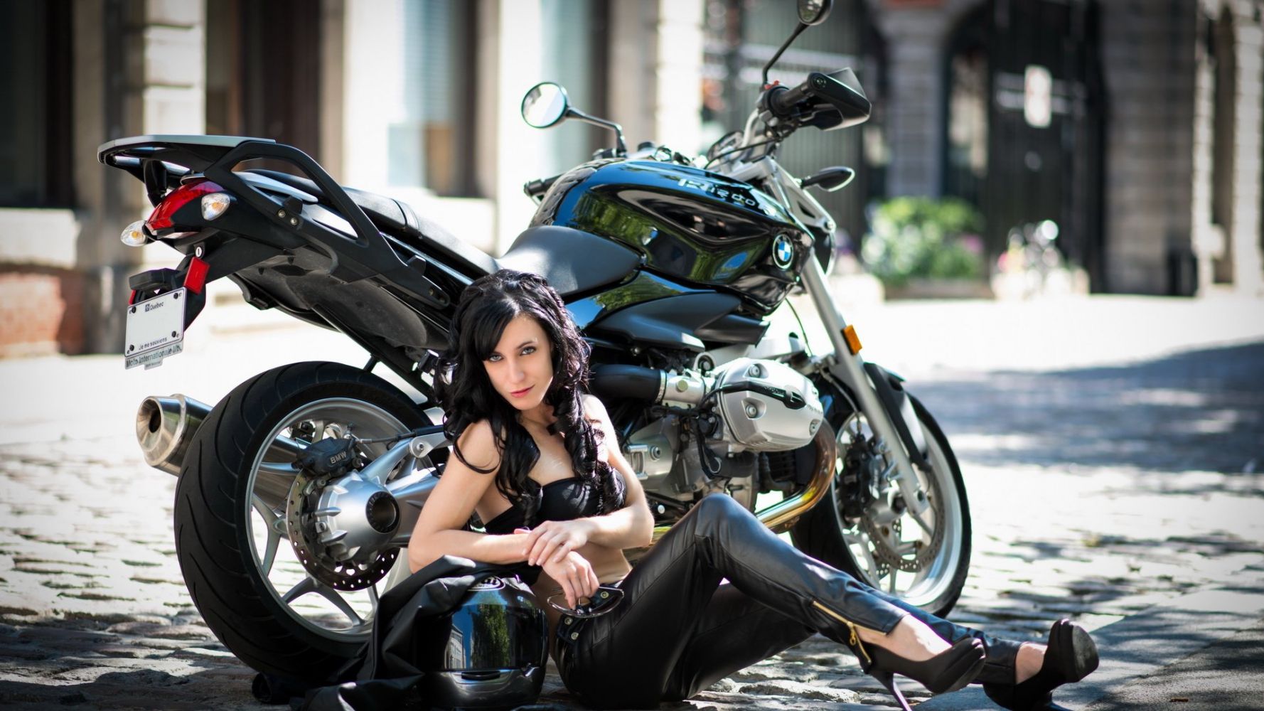 European women on bikes in Gitega